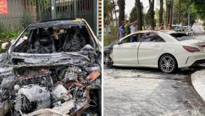 Mercedes-Benz CLA đâm vào cây rồi bốc cháy ven Hồ Tây